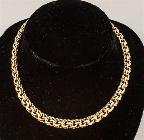 heavy gold choker.